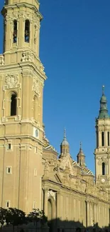 European cathedral with blue sky backdrop.