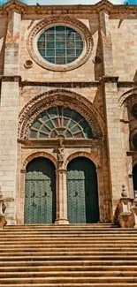 Steps leading to a majestic historic cathedral with ornate architecture.