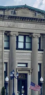 Historic Charleston Bank with columns and American flag.