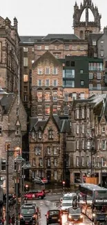 Historic city street with classic architecture and bustling traffic.