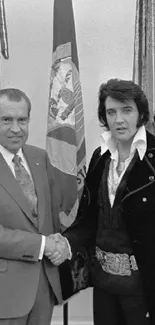 Black and white historical handshake moment captured in iconic photo wallpaper.