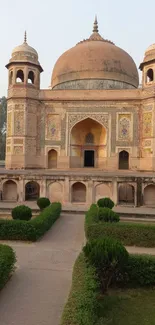 Historic architectural monument with lush greenery.