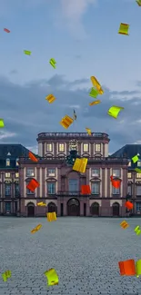 A historic European palace at dusk under a slate blue sky.