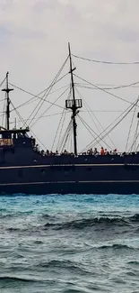 Historic sailing ship on ocean waves capturing nautical essence.