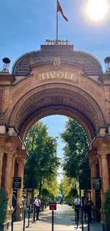 Sunlit entrance of Tivoli Gardens in Copenhagen.