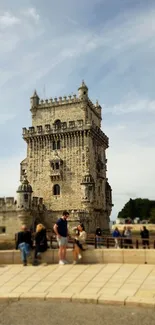 Historic tower with blue sky background, perfect for mobile wallpaper.