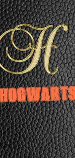 Hogwarts themed wallpaper with black leather texture background.