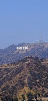 Hollywood Sign and hills under a clear blue sky.