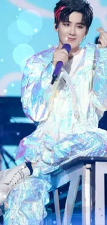 Vibrant holographic outfit on stage during performance.