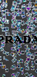 Holographic crystals with Prada logo on gray background.