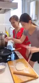 Mother and daughter cooking in a modern kitchen with traditional tools.