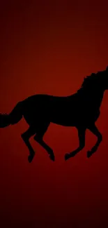 Silhouette of a horse on a dark red background, creating an elegant visual.