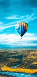 Colorful hot air balloon over a scenic landscape