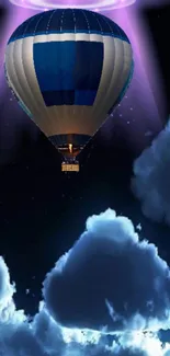 Hot air balloon soaring at night over dark clouds with a mysterious sky.