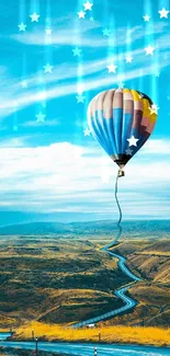 Fantasy landscape with a hot air balloon and starry sky.