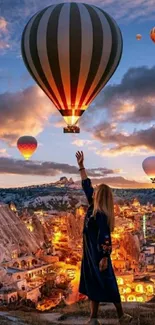 Hot air balloons soar over a glowing sunset landscape.