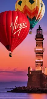 Vibrant hot air balloons float over a sunset-lit lighthouse on a calm ocean.