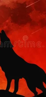 Silhouette of a wolf howling at a red full moon on a black background.