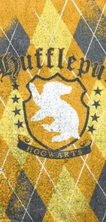 Hufflepuff crest on yellow and black diamond pattern mobile wallpaper.