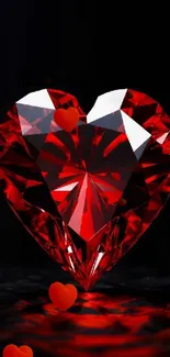 Heart-shaped red crystal gem on dark background wallpaper.