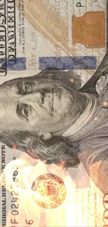 Close-up of a hundred dollar bill wallpaper with detailed print.