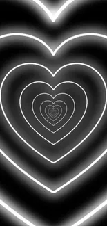 Hypnotic black and white heart pattern wallpaper for mobile devices.