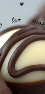 Close-up of artistic chocolate swirl design with the words 'I love chocolate'.