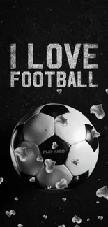 I Love Football wallpaper with soccer ball and hearts on black background.