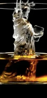 Ice Liberty statue in amber whiskey glass wallpaper.