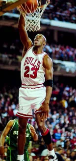 Basketball player dunking during a game, wearing a red jersey with number 23.