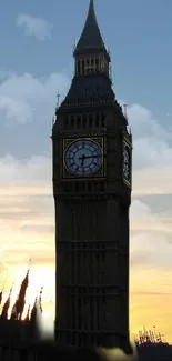 Big Ben silhouettes against a stunning sunset sky.