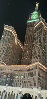 Illuminated iconic clock tower at night with glowing architectural beauty.