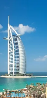 Dubai skyline with iconic sail-shaped building.