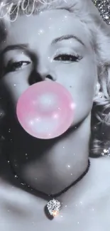 Grayscale portrait with pink bubblegum and glittery silver background.