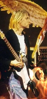 Rock musician with guitar and mannequin on stage.