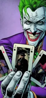 Joker holding three playing cards with a menacing smile.