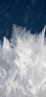 Intricate icy blue frost crystal wallpaper for mobile.