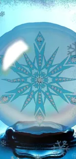 An icy blue snowflake inside a crystal sphere with frosty details.