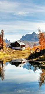 Serene autumn lake scene with vibrant foliage and mountains.