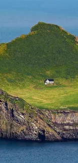 Scenic island view with house and ocean, perfect mobile wallpaper.