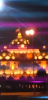 Night view of an illuminated temple glowing with vibrant lights.