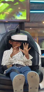 Child with VR headset immersed in virtual reality on a chair.