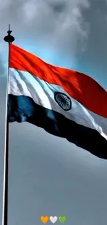 Indian flag waving against a clear sky.