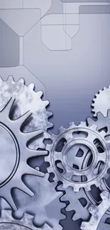 Mobile wallpaper featuring gray-blue industrial gears in a mechanical design.