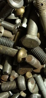 Mobile wallpaper showing various metal bolts and screws in gray tones.