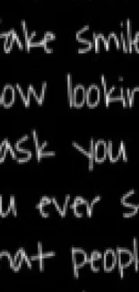 Inspirational quote text on a black background wallpaper.