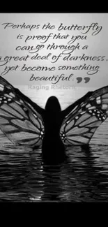 Butterfly silhouette with inspirational quote on water.