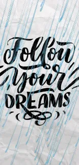 Follow Your Dreams calligraphy on textured mobile wallpaper.