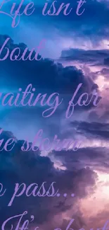 Inspirational wallpaper with cloudy sky and quote in purple hues.