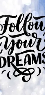 Inspirational 'Follow Your Dreams' text on a blue sky with clouds wallpaper.